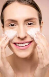 girl washing her face